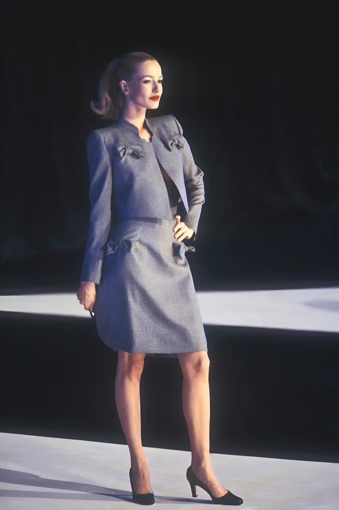 Model seen wearing a Jean Paul Gaultier skirt suit on the Fall 1996 runway show